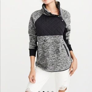 Abercrombie & Fitch “Asymmetrical Snap Up Fleece”